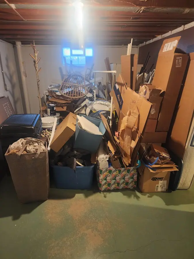 Roll-off dumpster container at job site for 6 Yard Dumpster Rental in Ranchettes